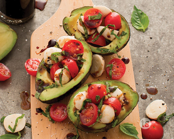 Caprese Stuffed Avocados – Avocados Filled With Tomatoes, Mozzarella, And Basil.