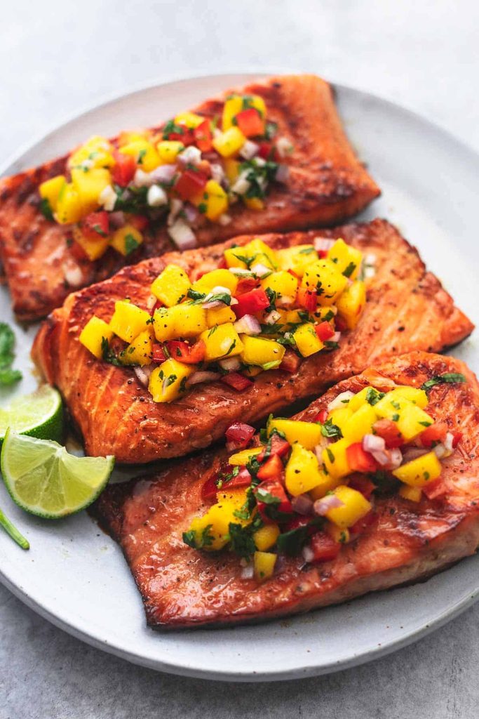 Salmon With Mango Salsa Recipe – Grilled Salmon Topped With Fresh Mango Salsa.