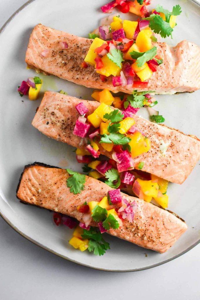 Salmon With Mango Salsa Recipe – Grilled Salmon Topped With Fresh Mango Salsa.