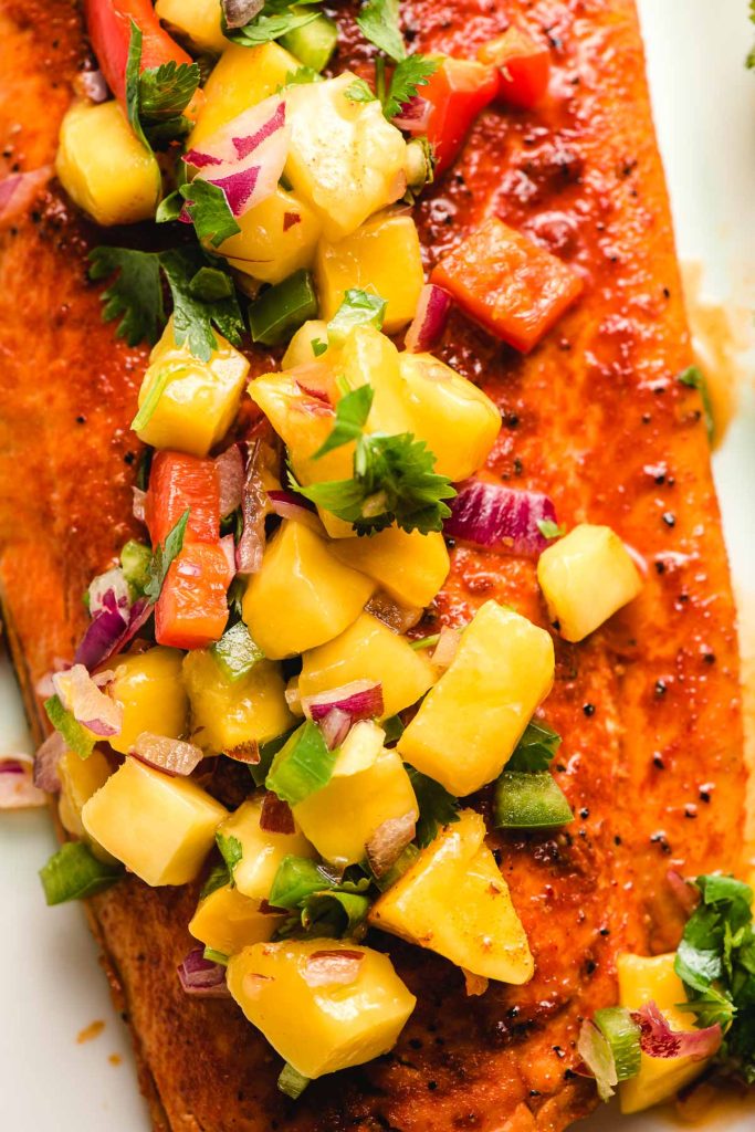 Salmon With Mango Salsa Recipe – Grilled Salmon Topped With Fresh Mango Salsa.